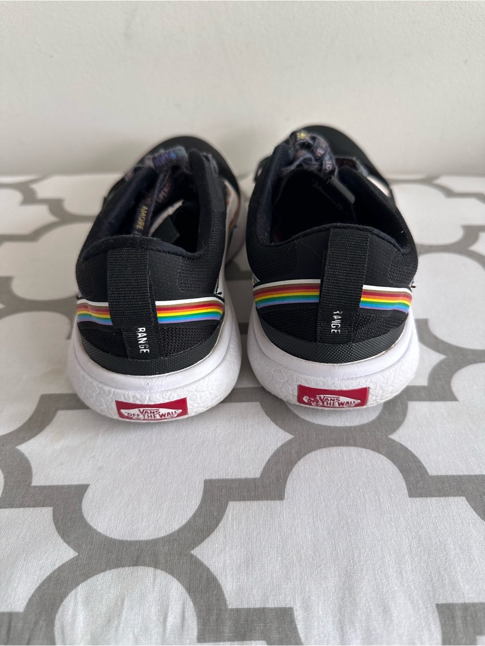 Vans Kids Black Slip-On Sneakers with Rainbow Stripe